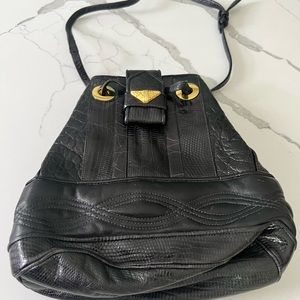 Sharif hand bag. Beautiful black leather with gold detail. Never used
